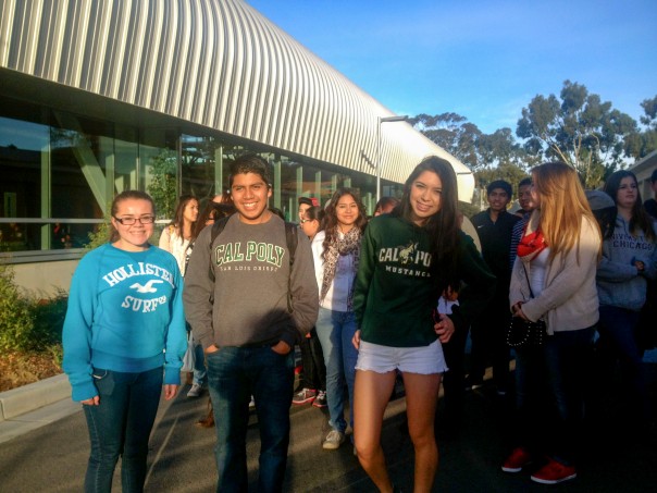 Volunteer and Cal Poly SLO student Mayra Mejia leading Santa Maria High School students to registration